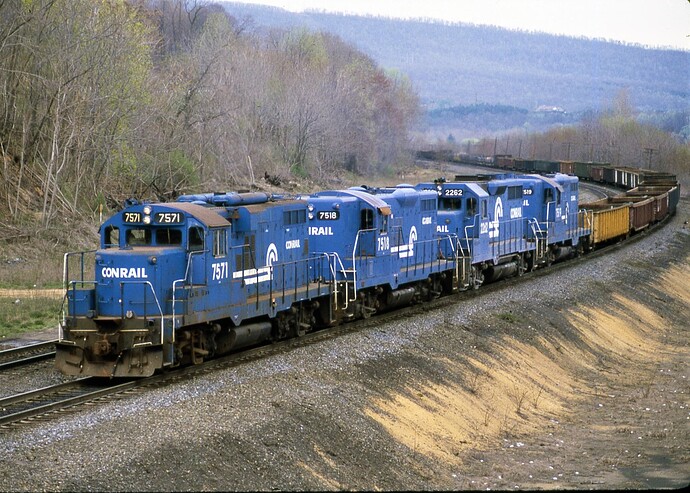CR. ex NYC-PC GP-10 #7571, ex PRR-PC GP-9 #7518, GP-35 #2262, ex PRR-PC  GP-9 #7519 with freight at Enola, PA yards. 4-28-84