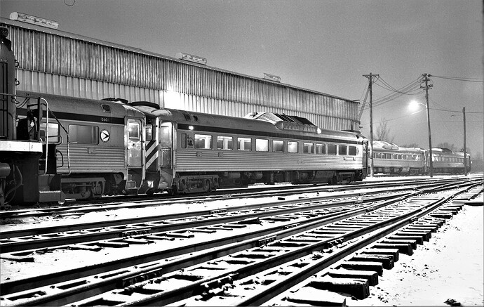 CNJ Raritan, NJ. Engine house. RDC #561 in snow at nite. 2-7-76