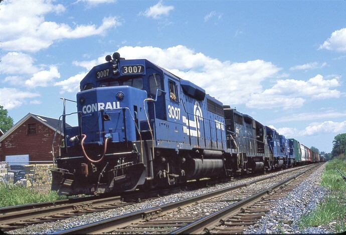 Conrail GP-40 #3007 (NYC blt 10-65) & 3 more units, with westbound freight in South Plainfield, NJ. August 1981