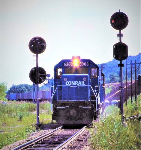 Conrail SD40-2 #6383 leads trailer train into the tunnel at Gallitzin, PA. Aug. 16, 1977