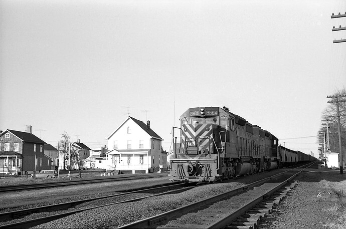 CNJ. SD-35 #2504 & SD-40 #3067 eastbound at Raritan, NJ. March 29, 1973.