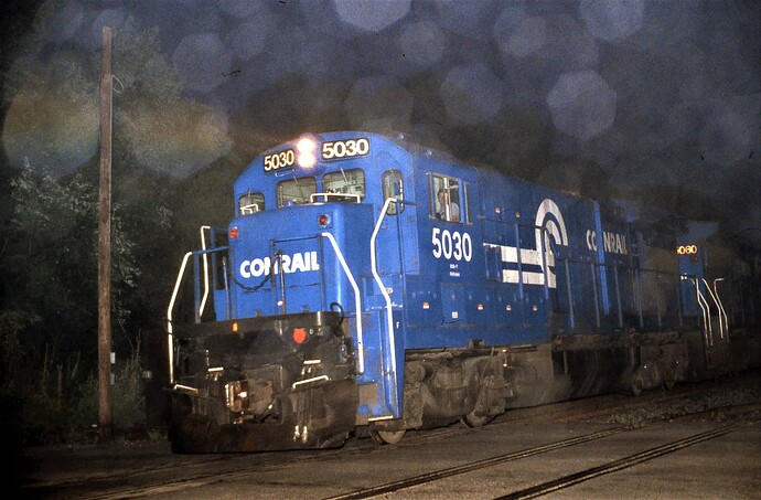 Photo 113. GE B36-7 #5030. Misty night at Prospect Ave crossing, Piscataway, NJ. Sept 1986