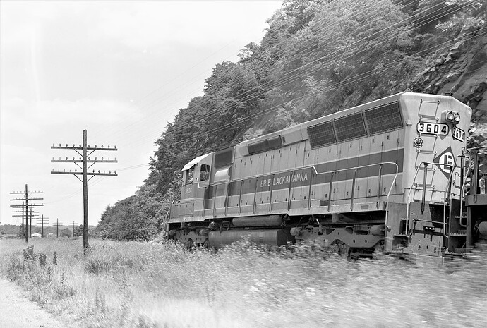 CR. Ex EL SD45 #3604 with freight CNF-1 at the slide fence on P&E. 7-15-76
