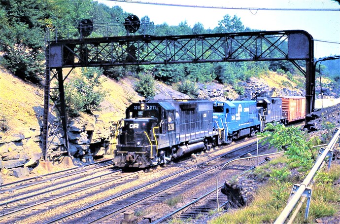 GP-40 #3211, U-30-B #2516, GP-38 #7899 at Bennington Interlocking approaching tunnels. July 15, 1978