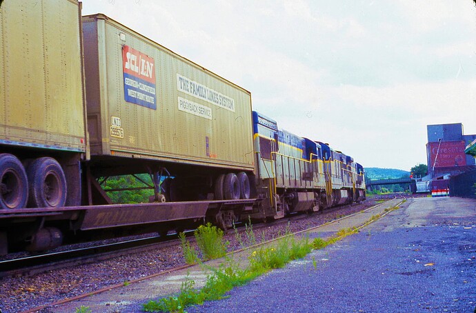 D&H freight passing Cersota Flour Mill. New Delhi, NY. 1977