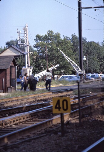NJT. South Amboy, NJ. Hand operated mechanical crossing gates at Augusta St. Sept 1983