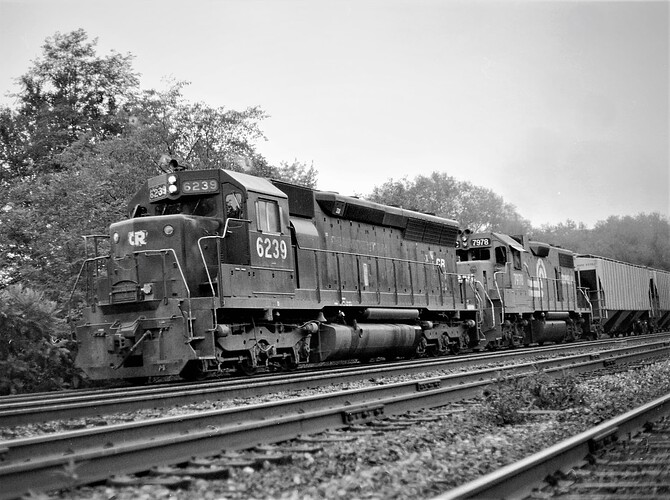 Conrail SD45 #6239 (blt Aug 1968) & GP38-2  #7978 (blt PC June 1972) westbound grain freight at Cove, PA. Aug. 17, 1978