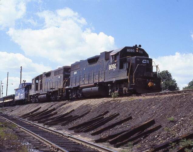 Conrail. GP-40 #8090 & 7812 pushers used as dynamic braking heading down grade at Gallitzin, PA. July 1977