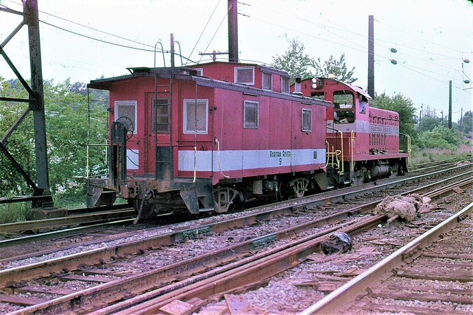 Raritan River RR at South Amboy, NJ. SW-900 # 3 and caboose # 9. Sept 1979