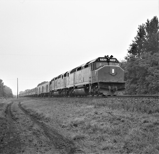Penn Central at Cove, PA. Amtrak train 30 (National Limited) engine # 592. East Bound. Oct 1974