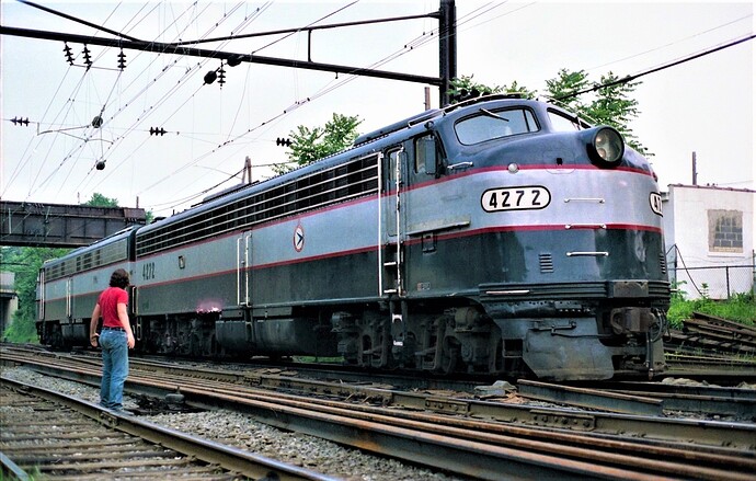 NJT E-8 #4272 (PRR #5702 blt 9-52, DLW #808; PC #4272) & #4285 (NYC & PC #4080) at South Amboy, NJ. Aug 1981