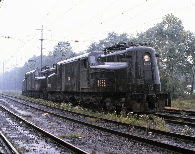 Conrail. GG-1 #4852 & #4894. West Fairview, PA, rainy day on Sept. 15, 1979