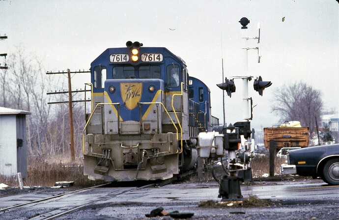 D&H GP39-2 #7614, Alco CRS-36 #5007 running light at Avoca in March 1980.