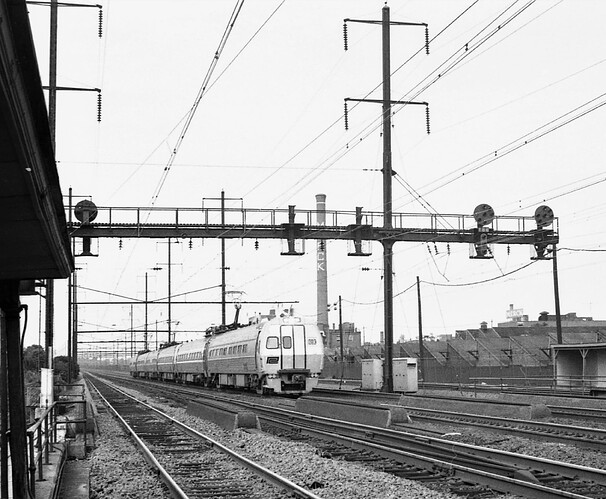 Metroliner #883 is east at No. Rahway, NJ. Sept 1972