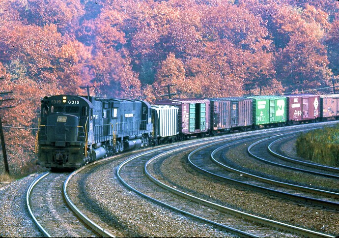 PC. Alco C-630 #6319 with EB freight. Benny Curve. 10-13-74