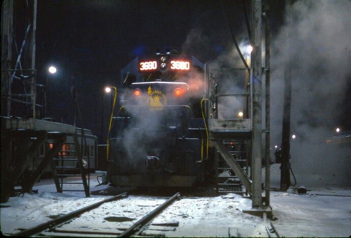 CNJ. GP40P #3680 is being serviced in February 1976. Raritan, NJ