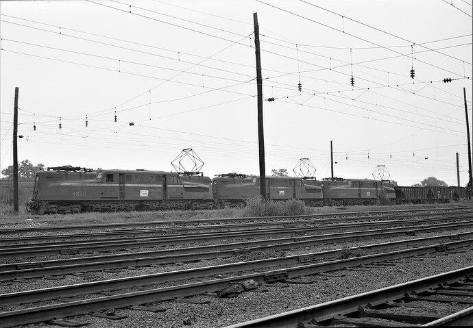 Penn Central. GG-1 #4850, #4844 & #4840 with coal train