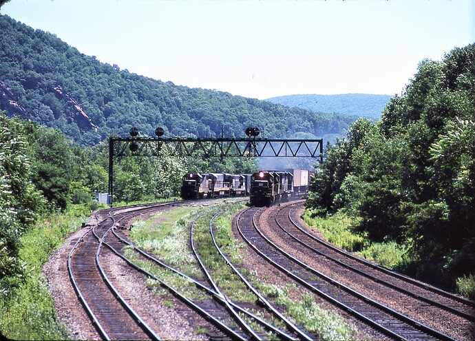CR. Banks Tower, 2 westbound freights. July 15, 1976