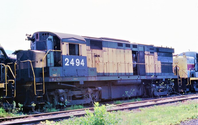 Conrail. Ex- Reading C424 #2494 on Altoona, PA scrap line. July 18, 1977