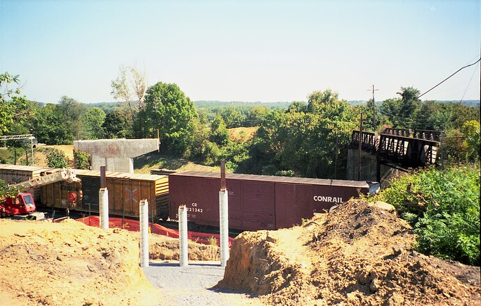Conrail. Construction of  New Marysville bridge being built. Iron Bridge on right side.  June 13, 1992