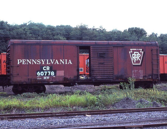 CR. ex PRR round top boxcar. MW #60778. Altoona scrap line. Aug. 23, 1980