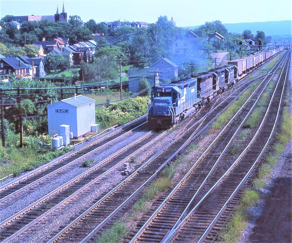 Conrail. SD45-2 #6691 & friends on westbound trailer train at CP Slope, Altoona, PA. Aug 16,  1977