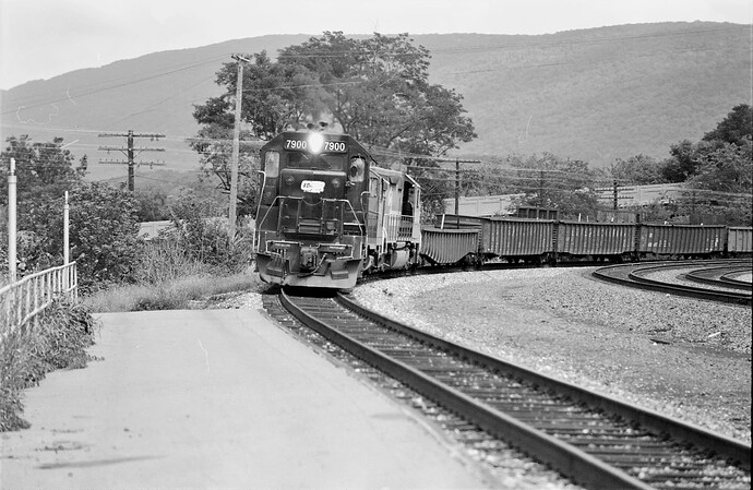 Conrail. GP-38 #7900 (ex-PC, blt 2-1971) with freight at Lewistown, PA. July 1978
