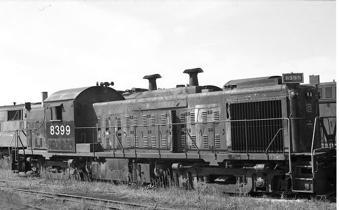 PC 8399, Altoona scrap track, Lima Hamilton Baldwin 1200hp, w-EMD 567V12. Sept 1973