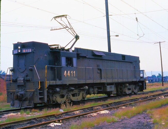 Penn Central. E-44 # 4411 at Harrisburg, PA. July 15, 1976