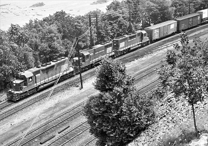 Penn Central. Banks Tower, PC SD-40 # 6047; GP-35 # 2391, GP-40 # 3090 in June 1974.