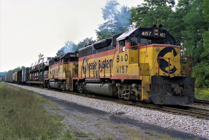 Chessie. GP40-2 # 4157 & 4143 on freight. Caruthers Tunnel. Paw-Paw, WV. Sept 1978