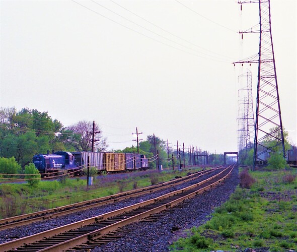Photo 80.  RS-3M #9947 (ex CNJ #1701) with freight on ex-Reading Railroad Port Reading branch at Bound Brook, NJ 1981