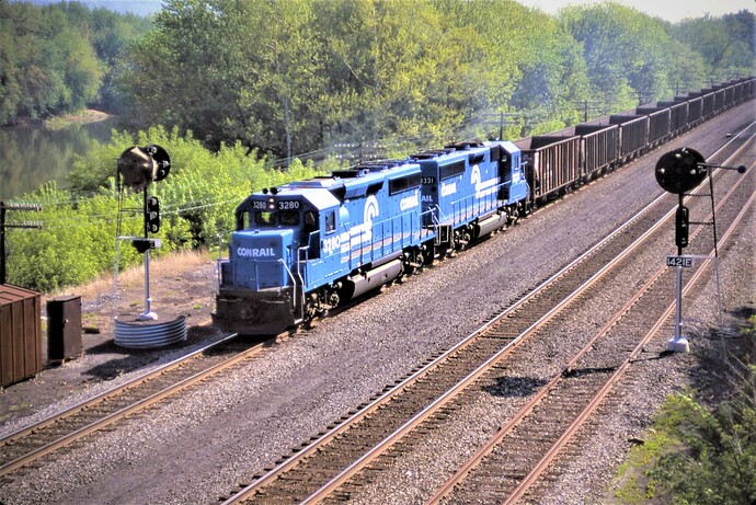 Conrail. GP 40-2 #3280 & #3331 on east empty coal train at MG Tower on Horseshoe Curve, PA. May 5, 1986