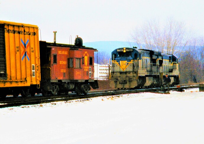 D&H. GE- #756 & #761, coupling to freight for pushing to Belden, tunnel. Conklin Yard, Binghamton, NY. Feb 1982