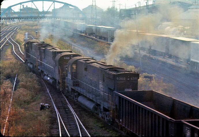 PC. C-630 #6323, 6321 & C628 #6302 eastbound at Works Tower, Altoona, PA. 10-13-74