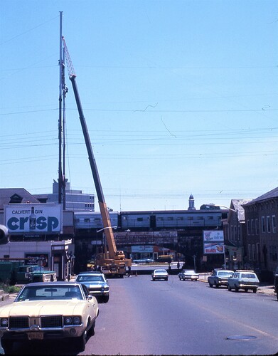 New Brunswick, NJ. PSEG high power towers over Main Line. 1974
