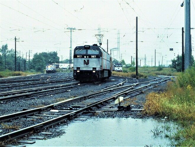 NJT E-60 #967. Other E-60's are in the layover yard in South Amboy, NJ. April 1987