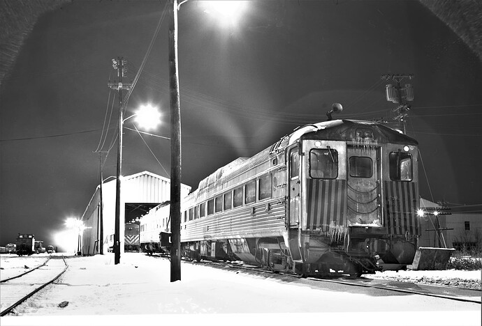 CNJ. Raritan, NJ enginehouse & icicles on RDC trainset.  Very cold Jan 15, 1974