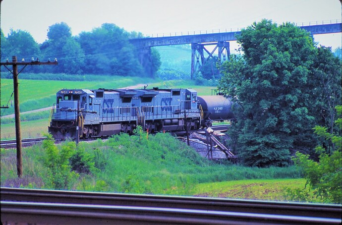 CSX. GE C40-8CW #7541 & #7523 in CSX-g paint. Salisbury Viaduct in background. June 13, 1992