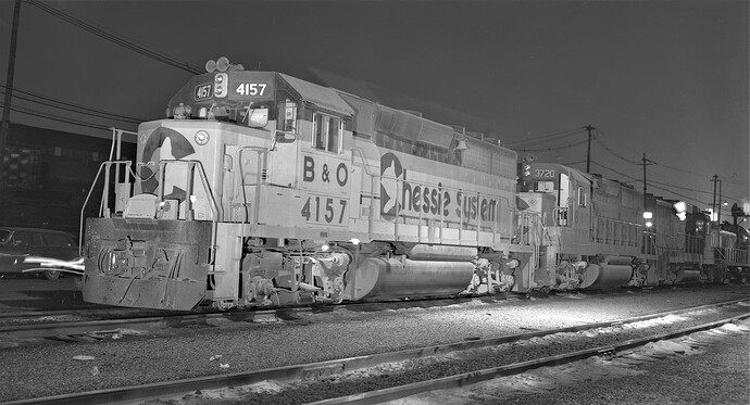 CNJ. Chessie GP40-2 #4157, GP35 #3720 a GP30 & an RS-3. March 1974