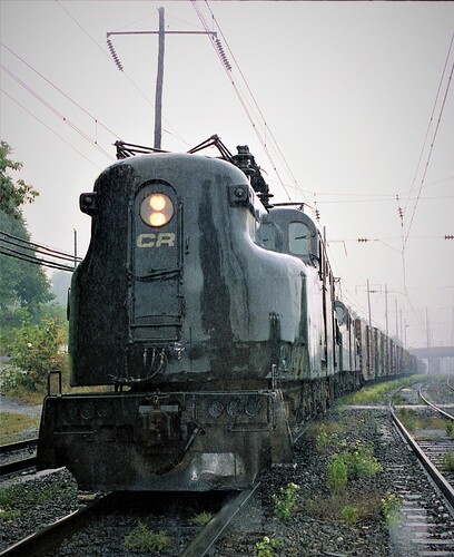Conrail GG-1 # 4865 on rainy day at Fairview, west end Enola, PA. 9-15-79