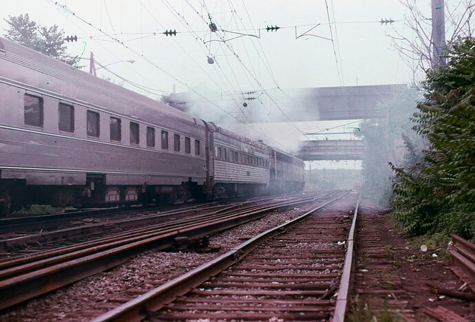 NJT. E-8's with westbound passenger for Bay Head, NJ. South Amboy, NJ. Sept 1980