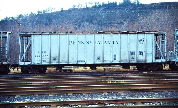 PRR H41 covered hopper #261003. Altoona scrap line. November 1987.