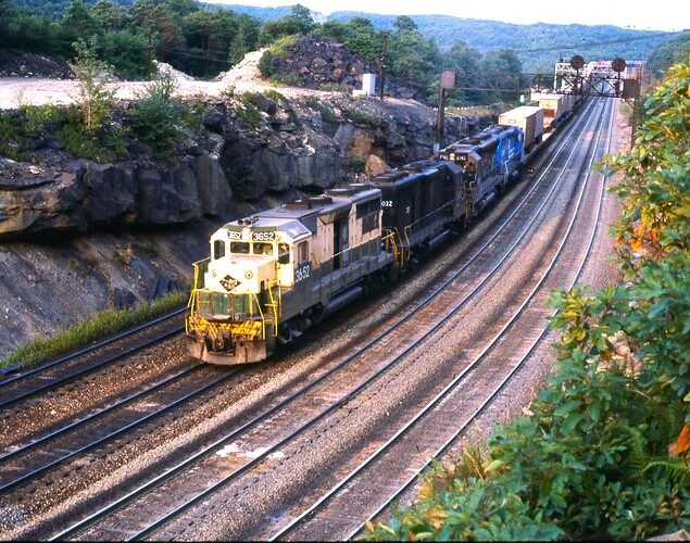CR. GP40 #3652 (ex Reading), GP40 # 8032, ex PC SD-45 #6145 and other unit east TV at Bennington,  August 1978