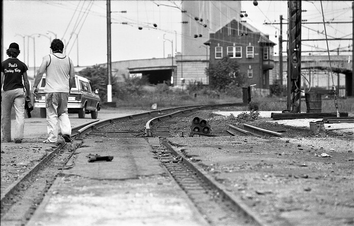 Amtrak. Harrisburg, PA.  Harris Tower and abandoned tack. Aug 1977