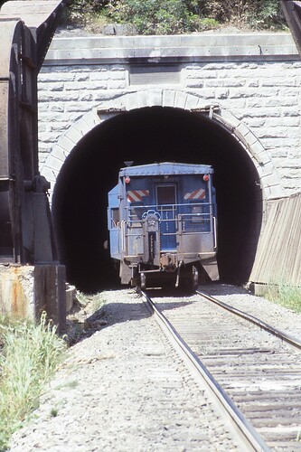 Conrail. Into the tunnel!  Gallitzin, PA. August 16, 1977. Photo B. Trogu